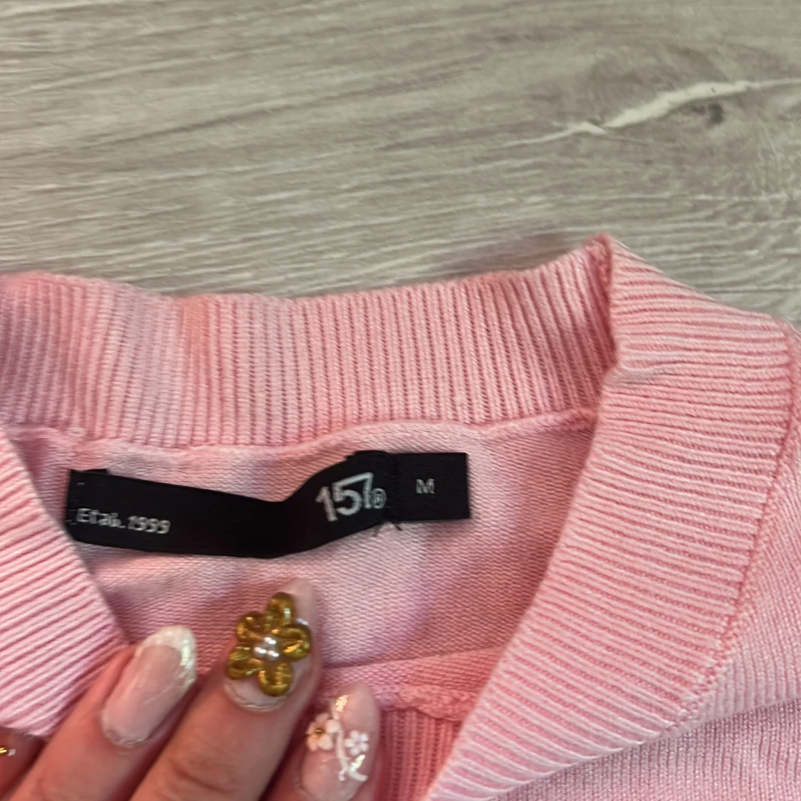 Ljusrosa stickad tröja 157 M - 1