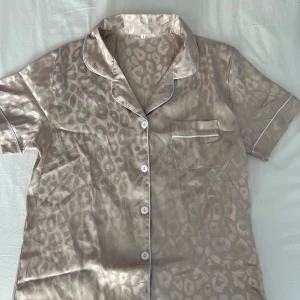 Leopard pyjamas  - Aldrig använd