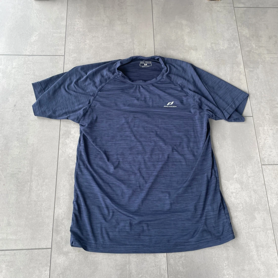 Blå träningst-shirt Pro Touch M