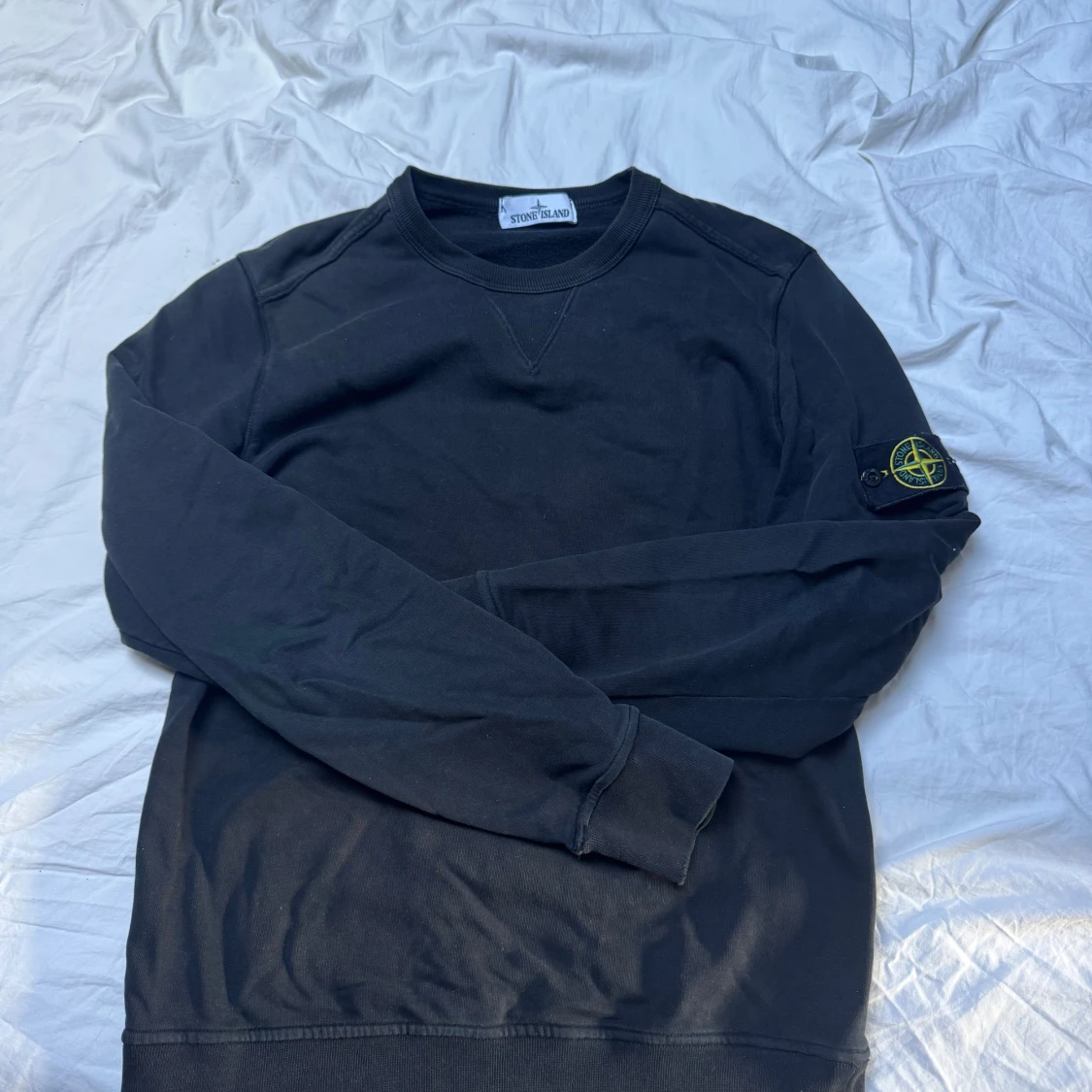 Svart Stone Island sweatshirt