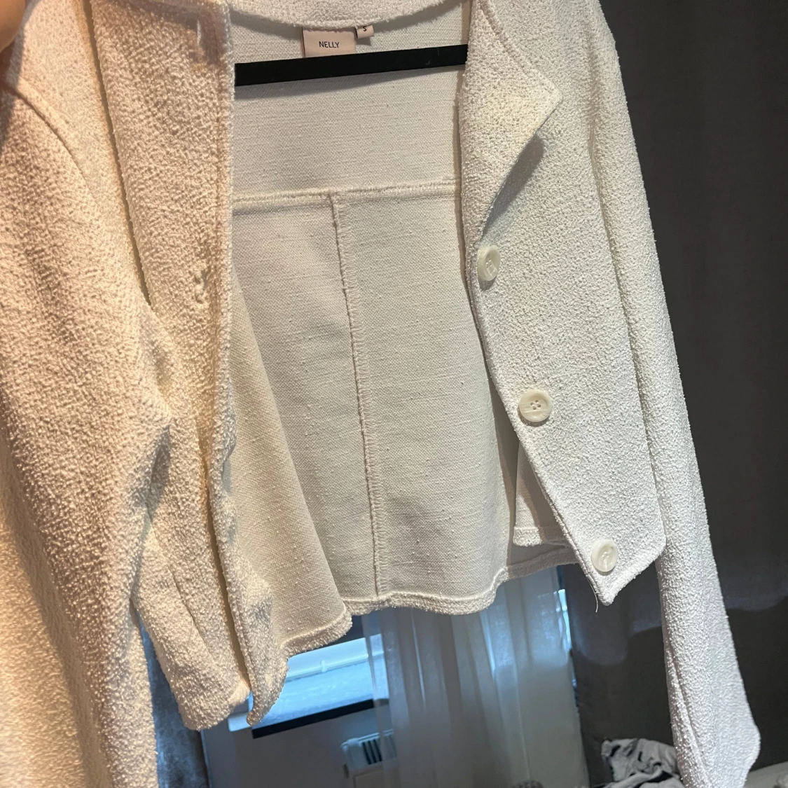 Vit boucléväst från Nelly - 2