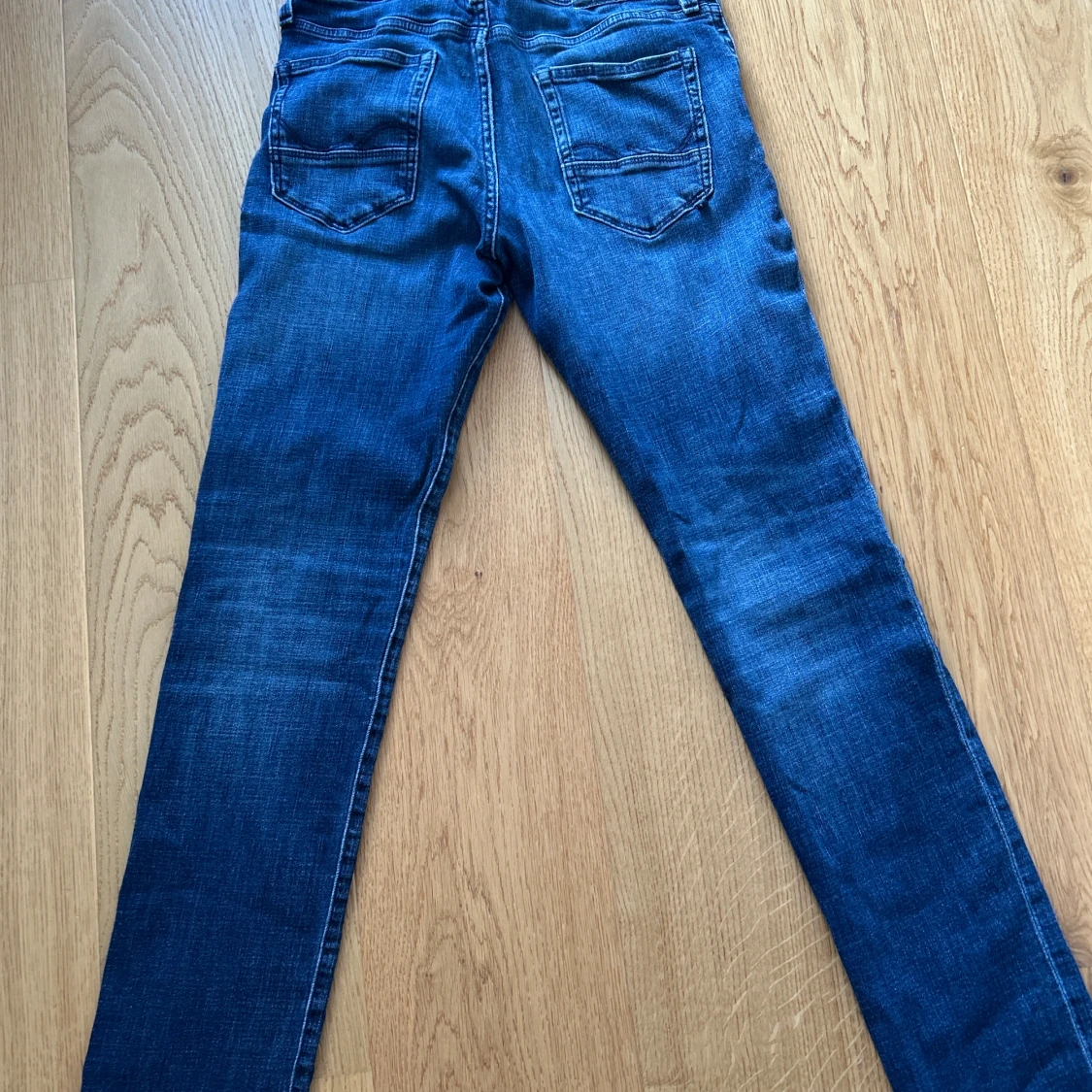 Slim blå jeans i storlek 30/34 - 2