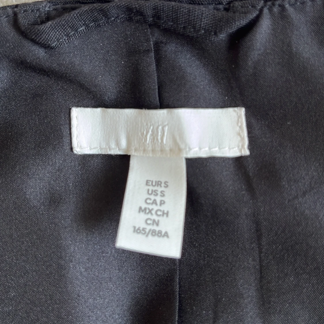 Svart väst-topp från H&M  - 2