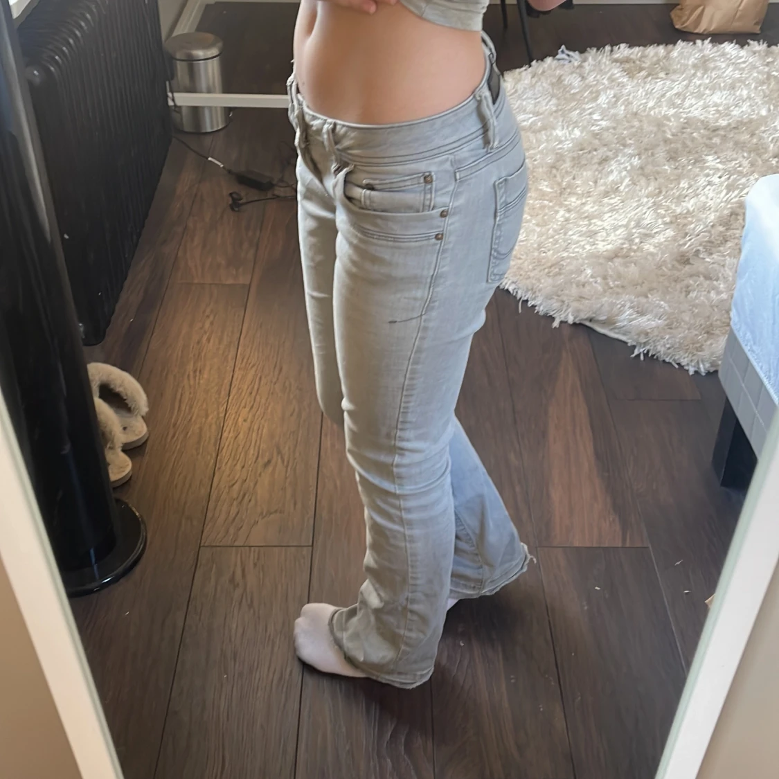 Ljusblå bootcut jeansbyxor