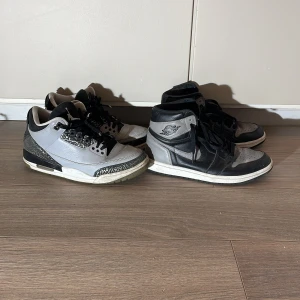 Två par jordans  - Två svart/gråa jordans till paketpris. Ett par Jordan 1 high och ett par Jordan 3, båda size 41 US 8. 300kr för båda!