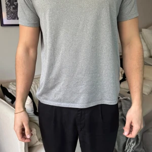 Grå t-shirt från Under Armour - Tränings T-shirt från Under Armour