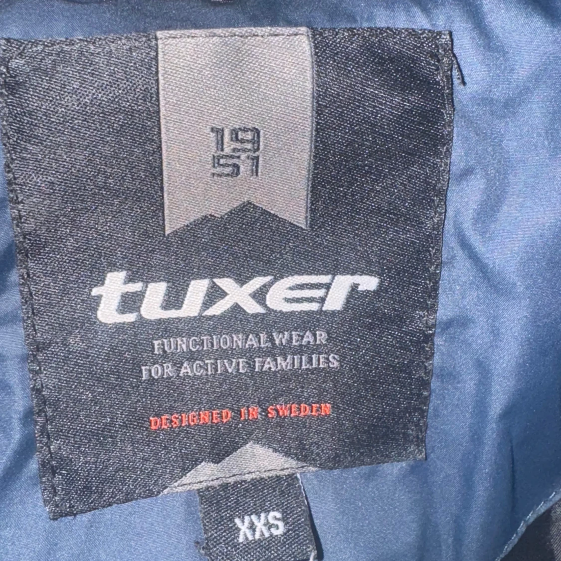 Blå dunjacka med huva från Tuxer XXS - 3