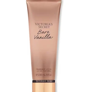 Victoria's Secret Bare Vanilla Fragrance Lotion - En lyxig doftlotion från Victoria's Secret med en förförisk vaniljdoft. Kommer i en elegant guldbrun tub på 236 ml. Perfekt för att återfukta huden och lämna en långvarig doft.