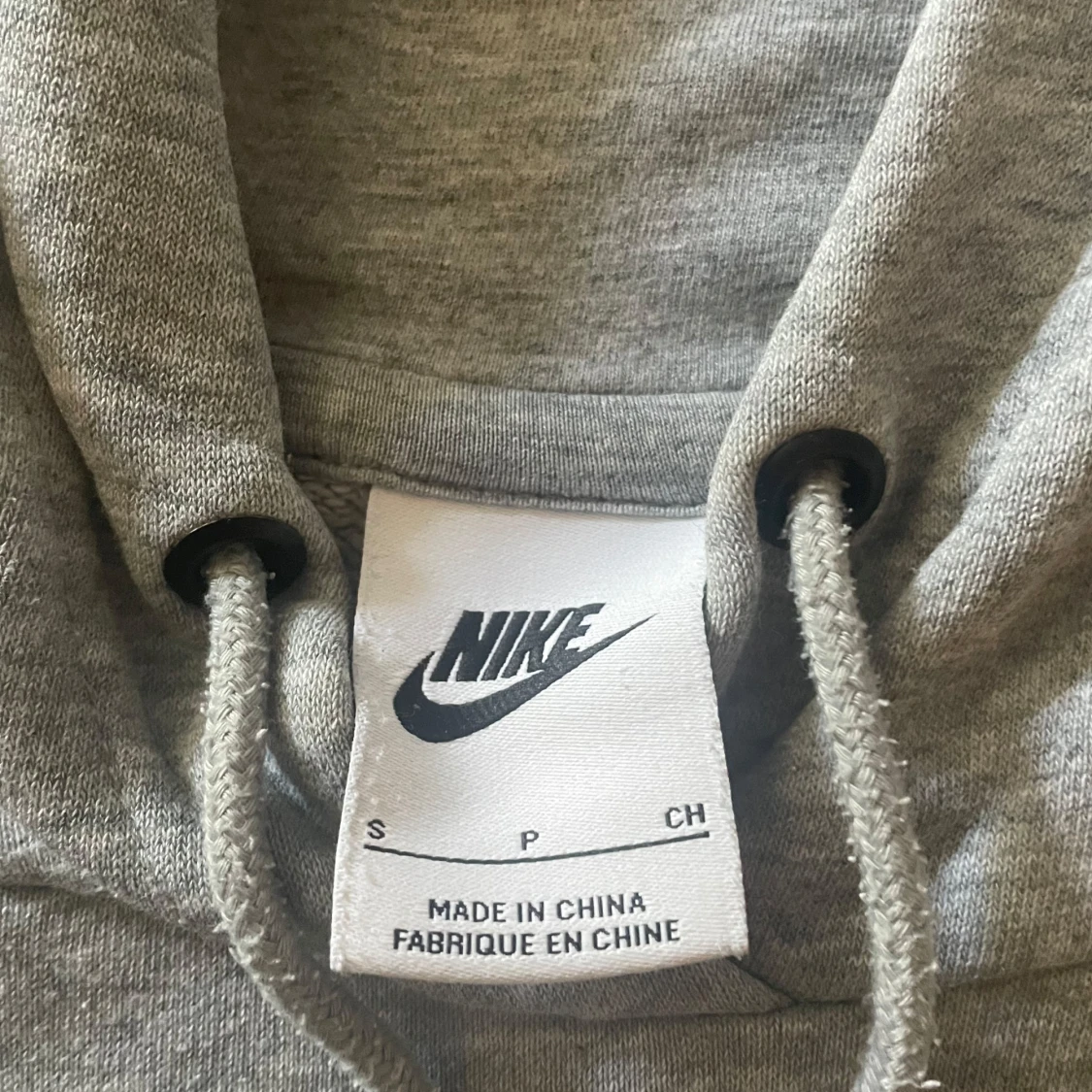 Grå hoodie från Nike - 1