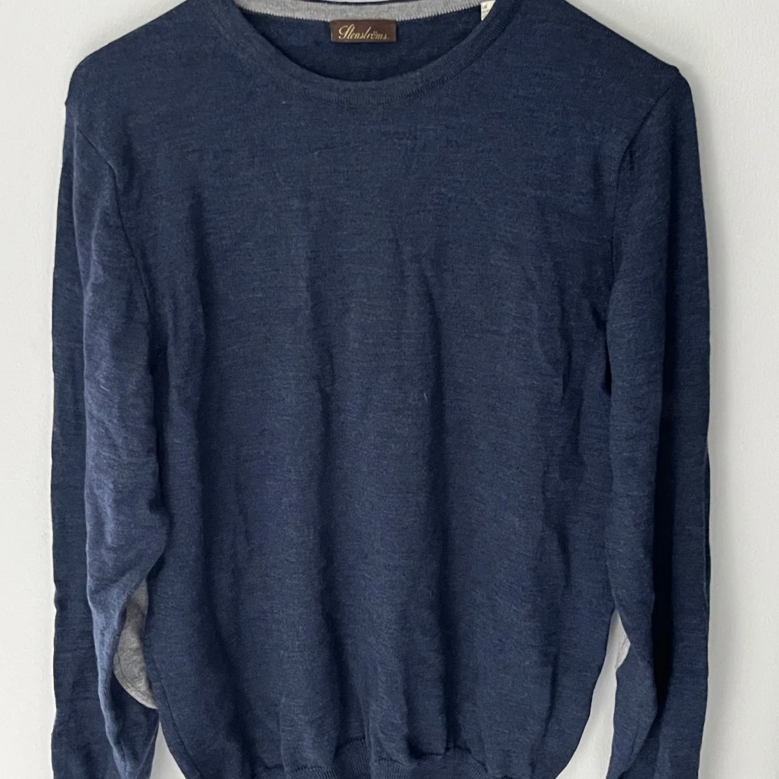 Blå stickad tröja från Stenströms