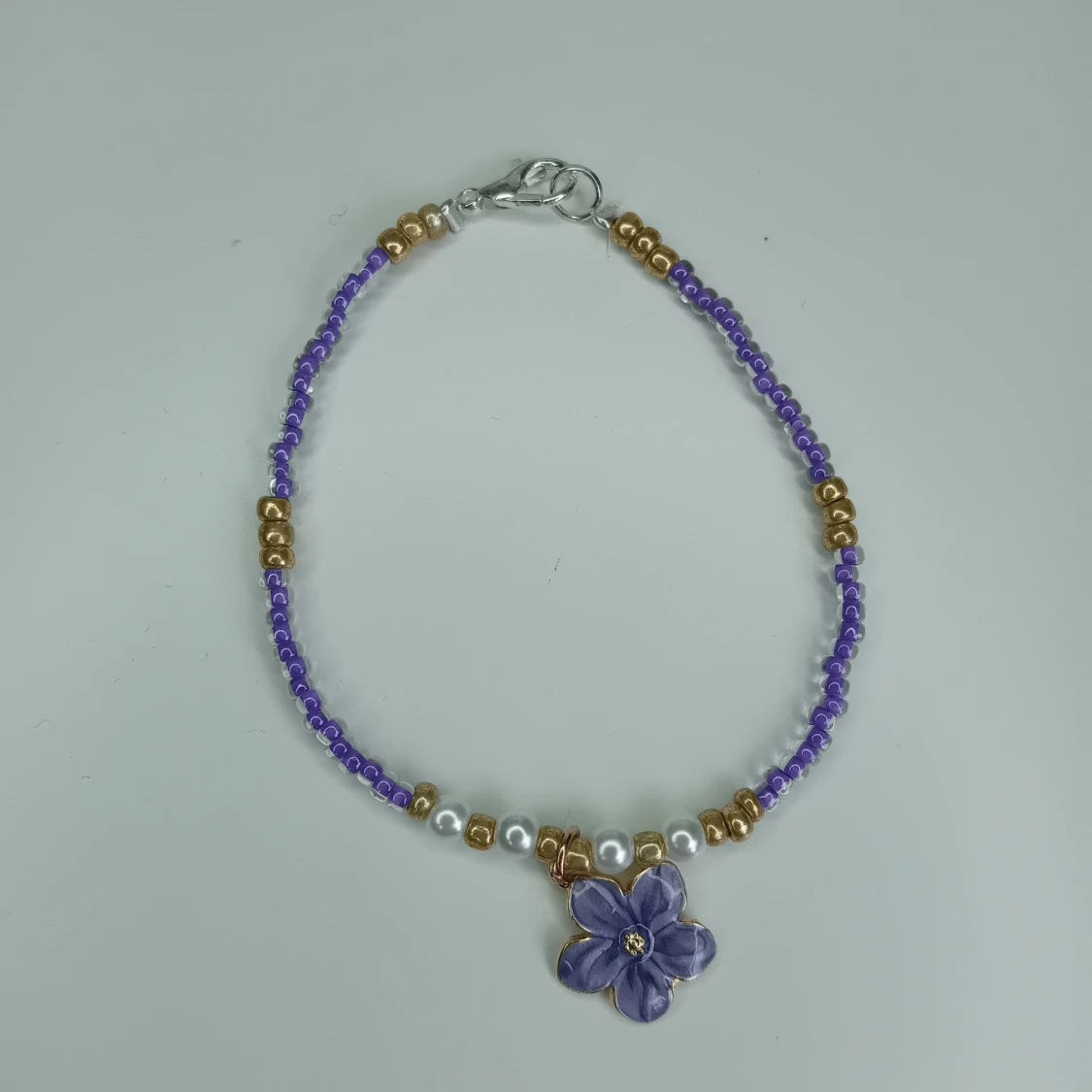 Handgjort armband berlock blomma