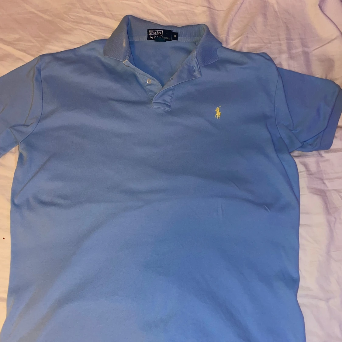 Blå pikétröja från Ralph Lauren