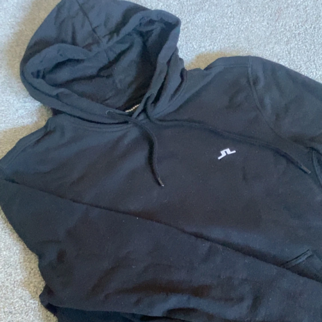 Svart hoodie från J.Lindeberg - 1