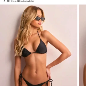 Svart trekantsbikini från Nelly - Säljer en svart bikiniöverdel från Nelly pga den var ett snäpp för stor. Aldrig anvönd, med lapp kvar. Priset är diskuterbart vid snabbt köp💓💓  kolla även min profil om du vill köpa den matchande underdelen 💓
