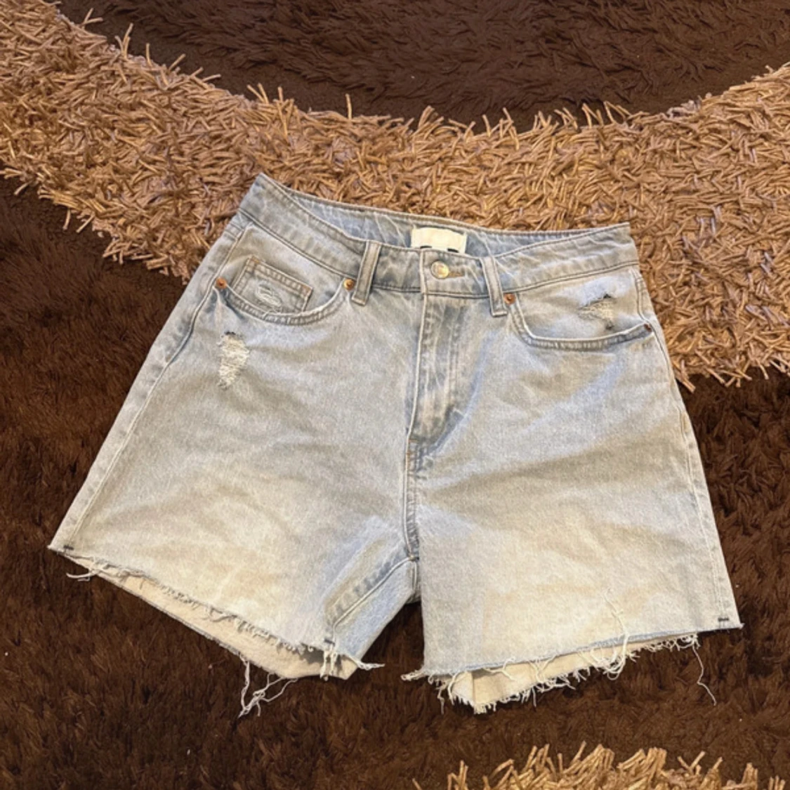 Ljusblå jeansshorts från H&M