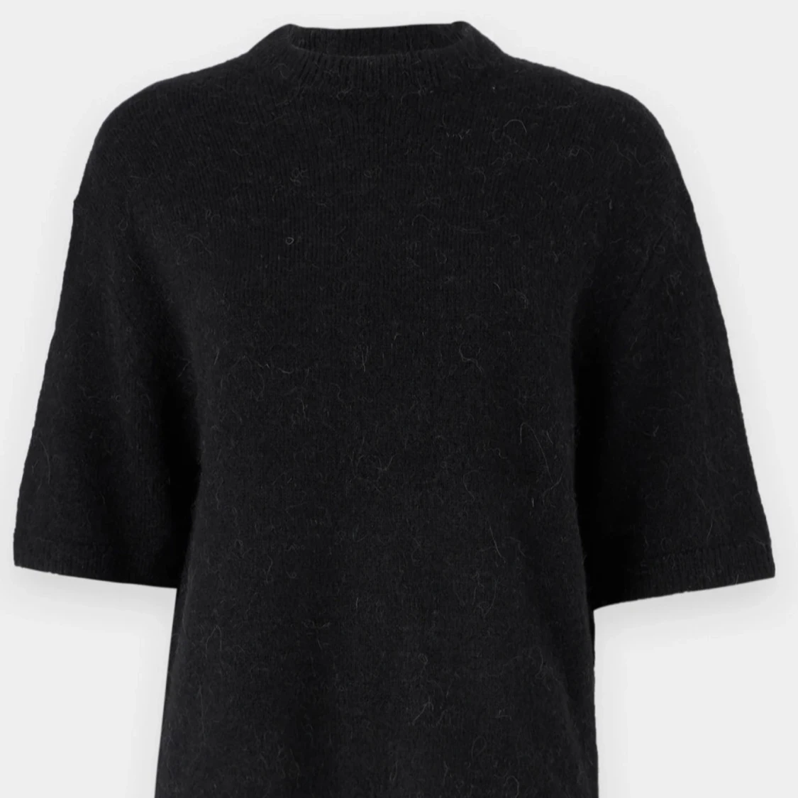Svart stickad tröja med kort ärm