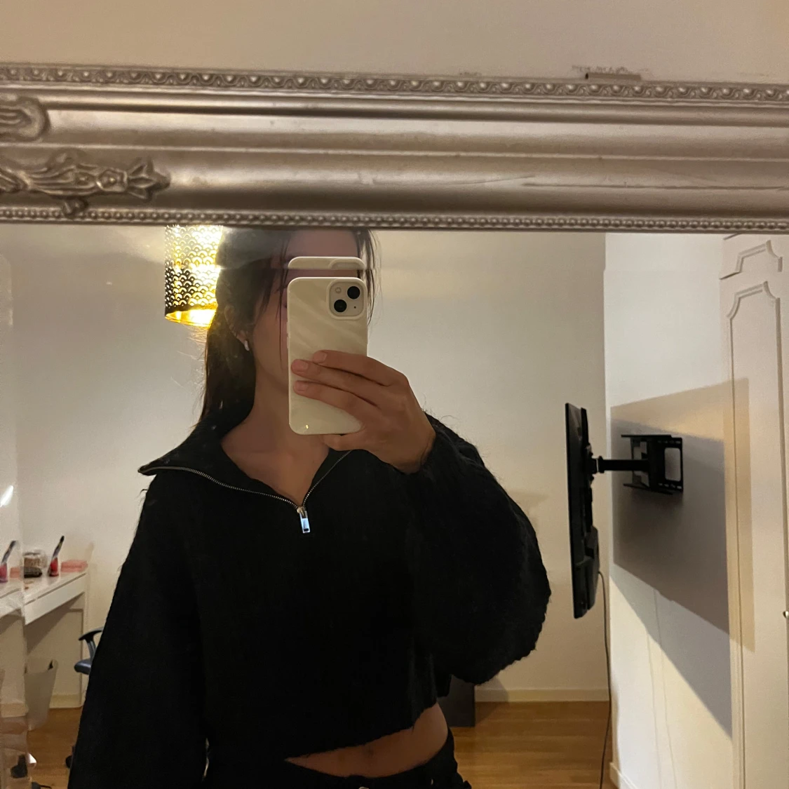 Svart stickad half zip från Gina Tricot