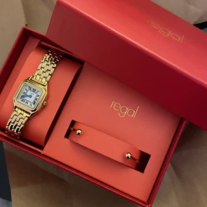 Guldfärgad klocka från Regal - Klocka i ny skick ( utan armband och boxen)