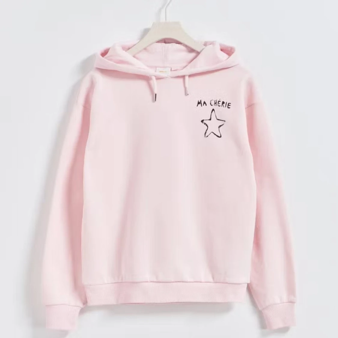 Ljusrosa hoodie från Gina Tricot