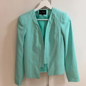 Turkos kavaj - Turkos kavaj använd 1 gång 