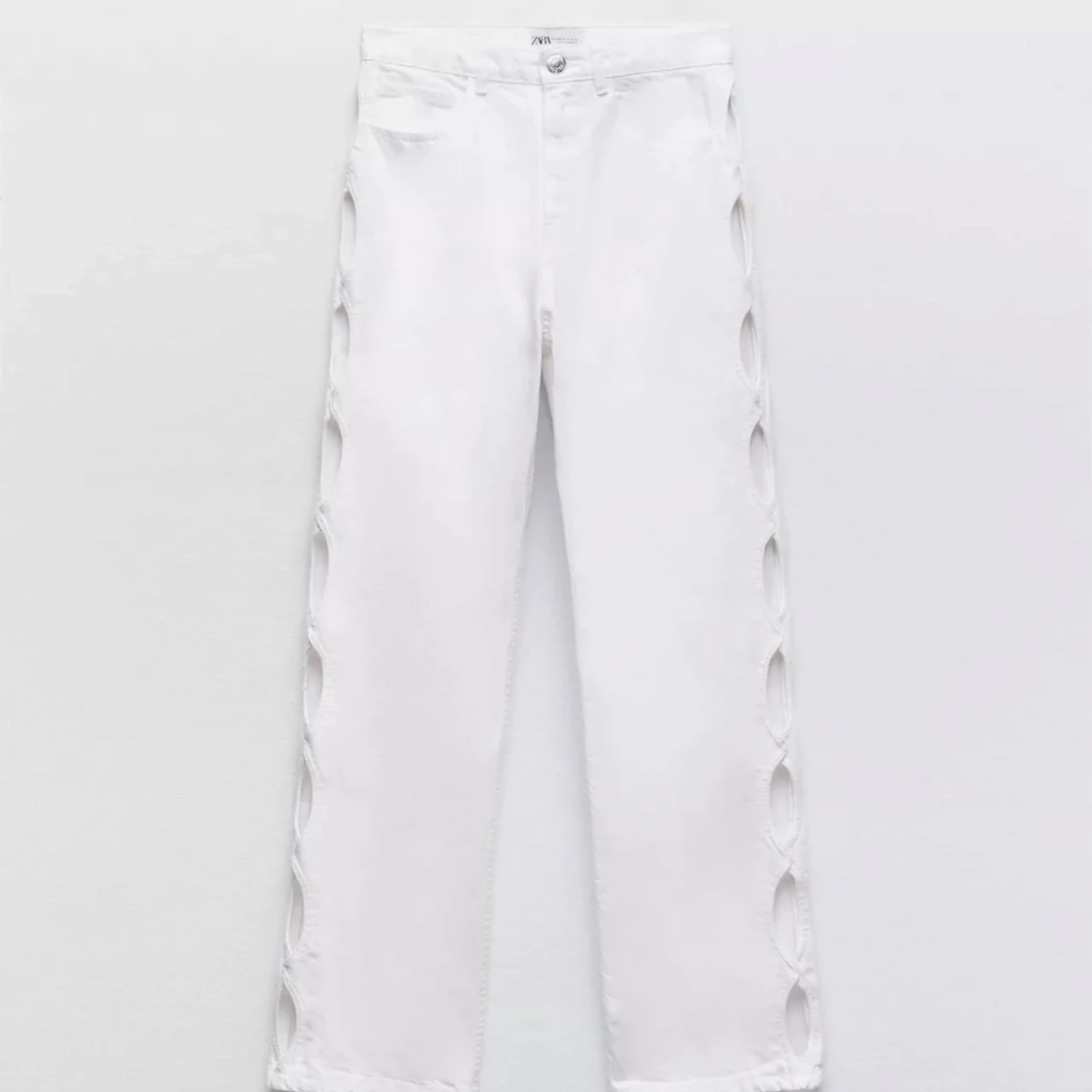 Zara Byxor med hål på sidorna