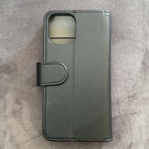 Svart plånboksfodral i skinn - Snyggt svart plånboksfodral 