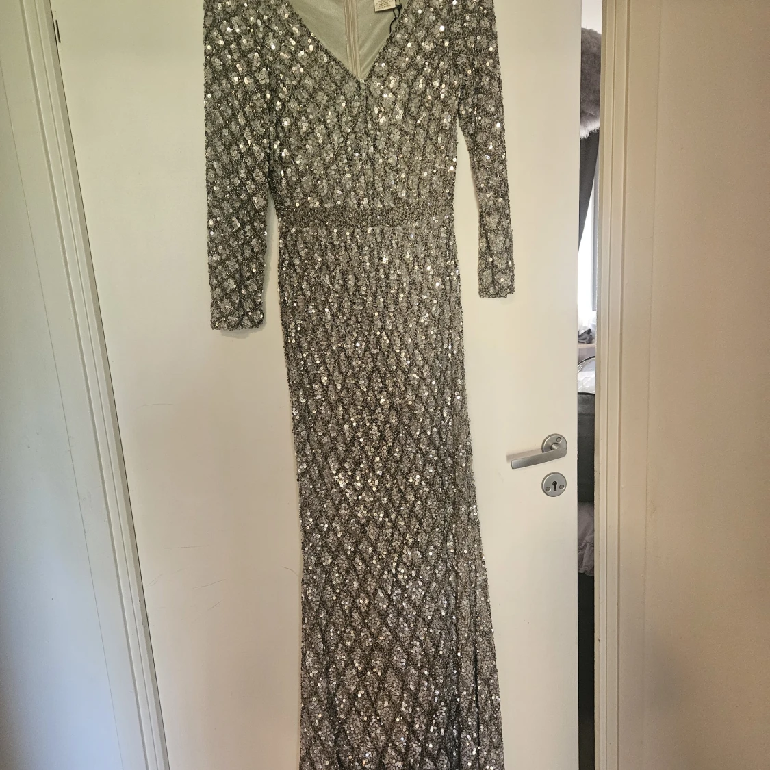 Glittrig långklänning från Mac Duggal