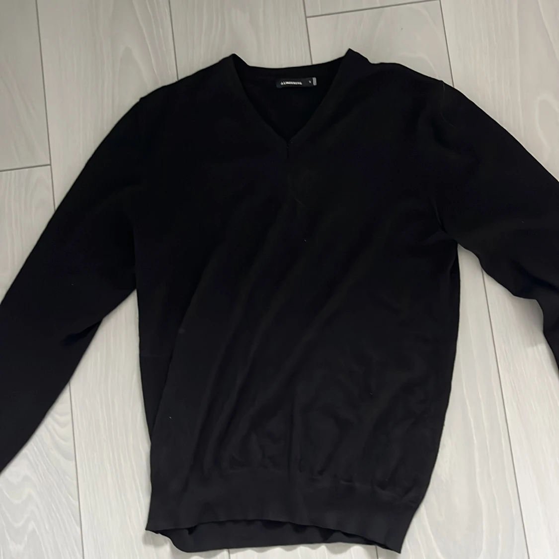 Svart merinoullströja från J.Lindeberg