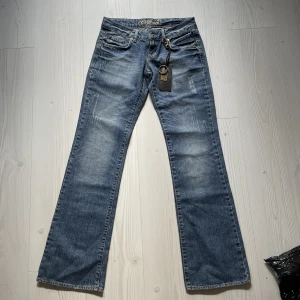 Supersnygga lågmidjade jeans - Längd 101 cm