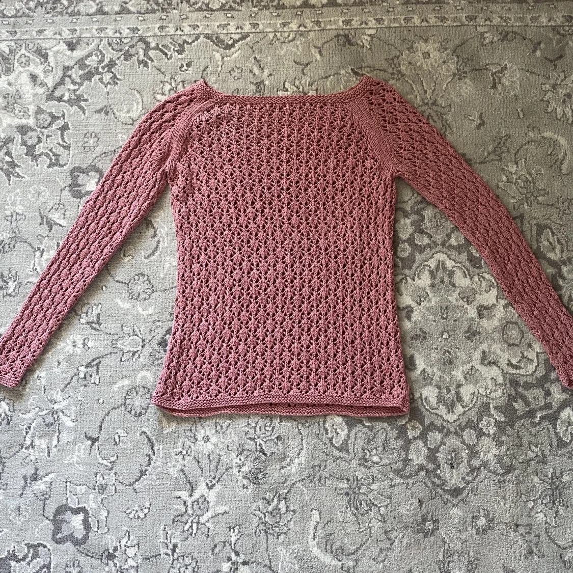 Rosa stickad tröja