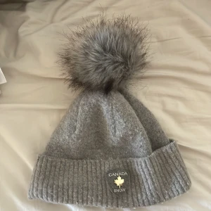 Mössa - En canada snow mössa fin men lite nopprig