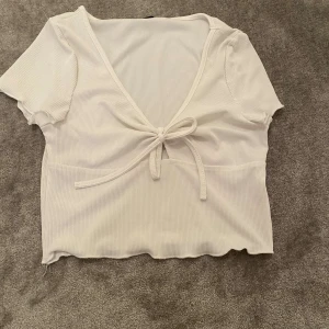 Topp - En vit t shirt