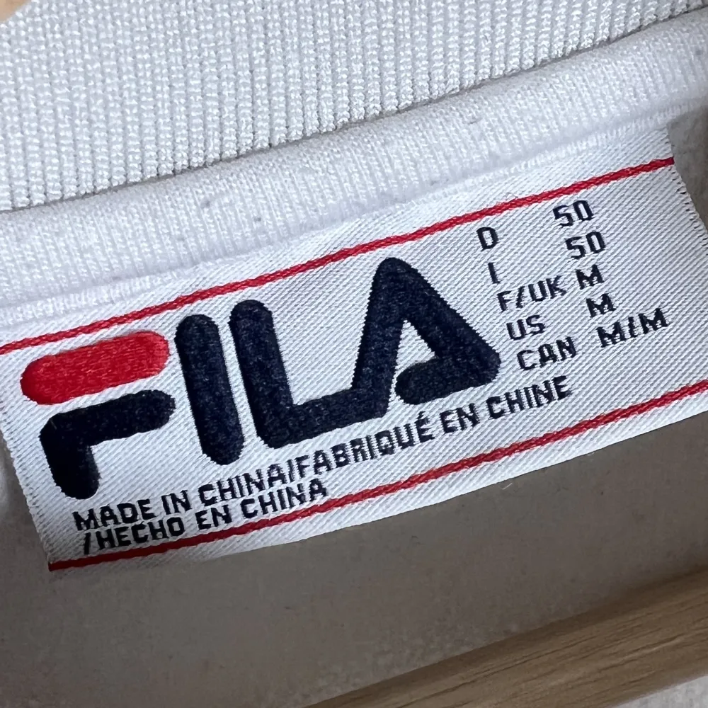 Fin halfzip tröja från fila. Neuletakit & Villapaidat.