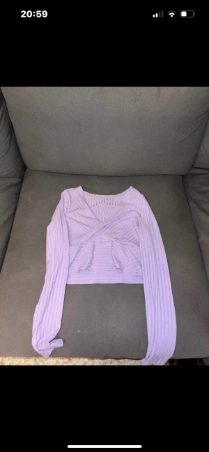 Topp -  aldrig använd då den var för liten sen jag fick den
