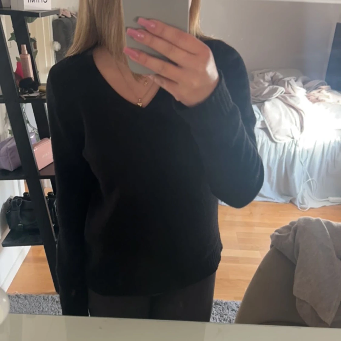 Svart stickad vila tröja