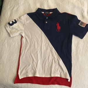 Ralph Lauren piké - Säljer nu denna fina och sommar fräscha polo pikén därför att den är för liten för mig.