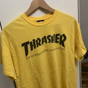 En Thrasher t-shirt köp på Zumiez i New York. Säljer den då jag aldrig använder den längre. Bra skick!