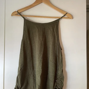 Linne - Grönt linne. Storlek: XL. 