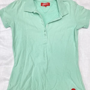 Turkos polo tröja - I gott skick!