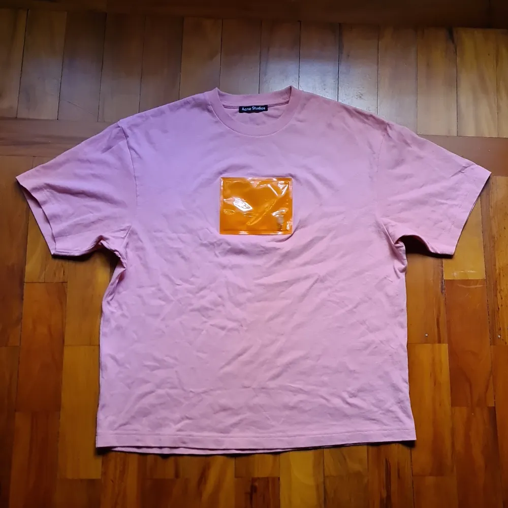 Bubblegum pink Acne Studios tshirt with orange face logo detail front. Bought at sample sale, but very good condition! . T-shirts.