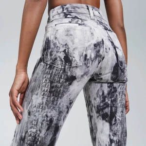 EYTYS Cypress Predator - EYTYS jeans i modellen Cypress, i en tie dye tvätt. Raka, midi höga. Storlek 27/34 nypris 1.900