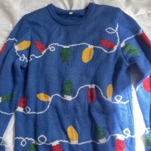 Jul tröja  - Bra skick, kan lysa 