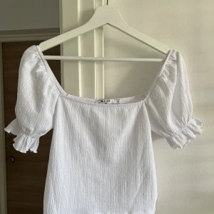 Vit topp - Aldrig använd  