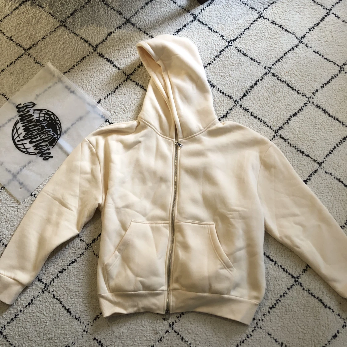 Brand of rides cream hoodie