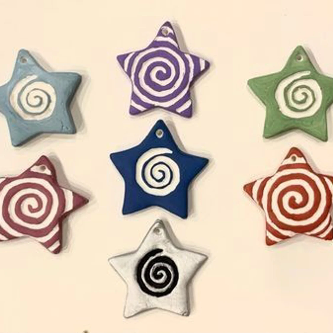 Pins with spiral star shaped clay charms!  grunge y2k goblincore swirl stars whimsical pagan