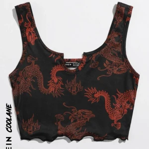 svart topp - svart topp med röda drakar. aldrig använd. pris kan diskuteras 