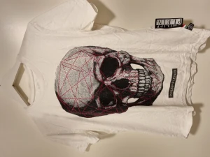 Philipp plein t-shirt  - Kopia. Fint skick. Med strass.