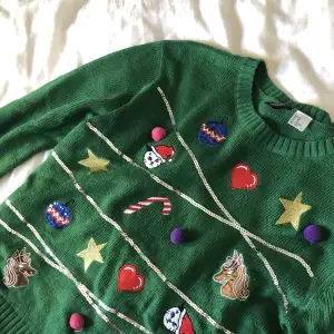 En grön jul-tröja i storlek xs. Nästan aldrig använd 
