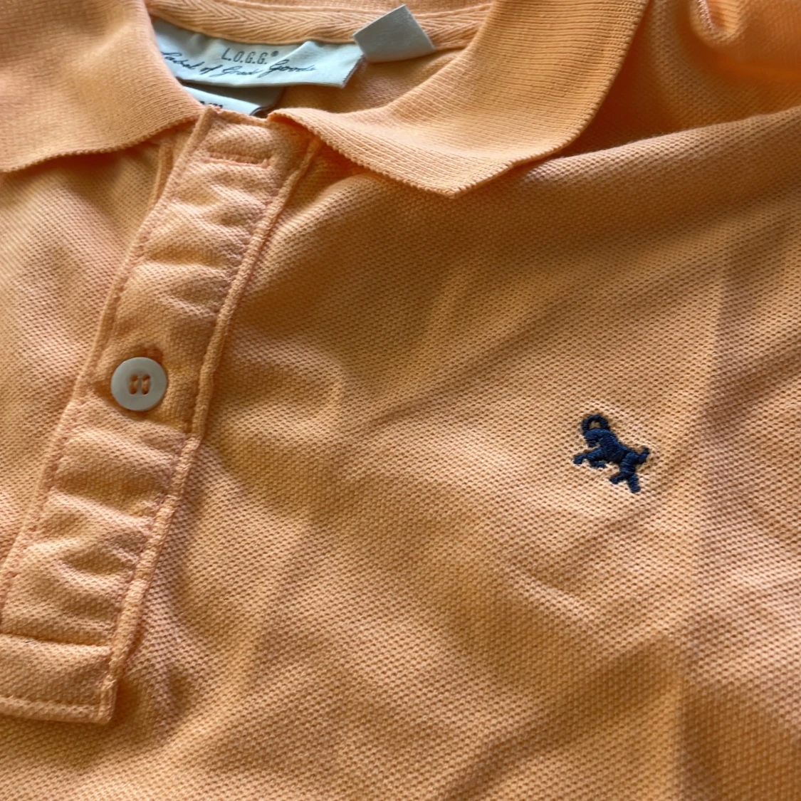 Orange pikétröja  - 90