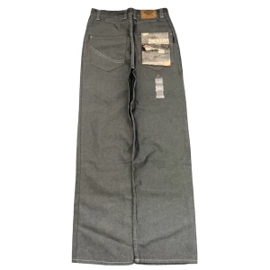 Nya vintage baggy Dickies jeans - Ovanliga vintage baggy jeans från Dickies som är helt nya med lappar kvar! Storlek 30x34.